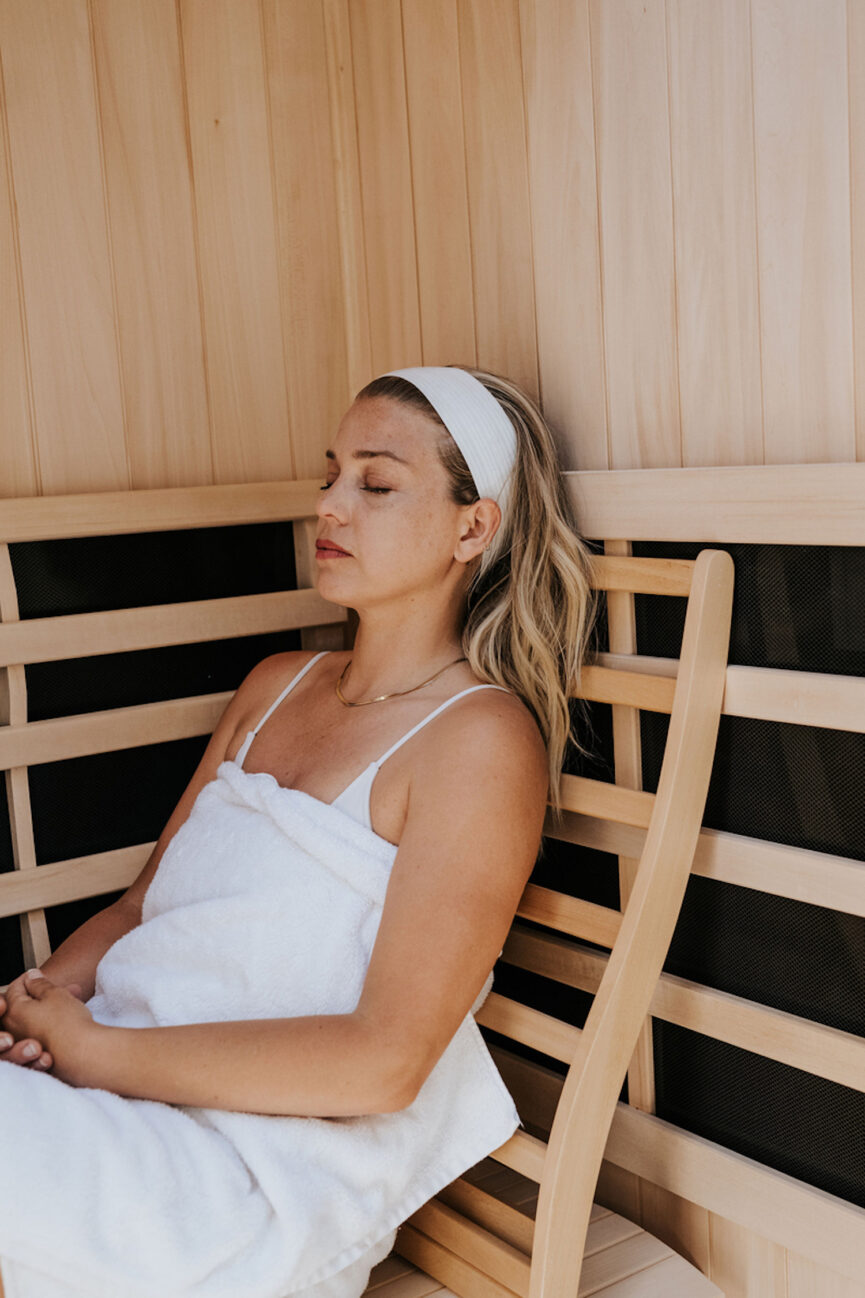 Woman using sauna.